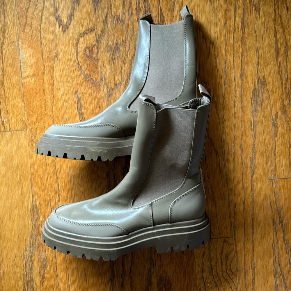 Rubber combat boots.